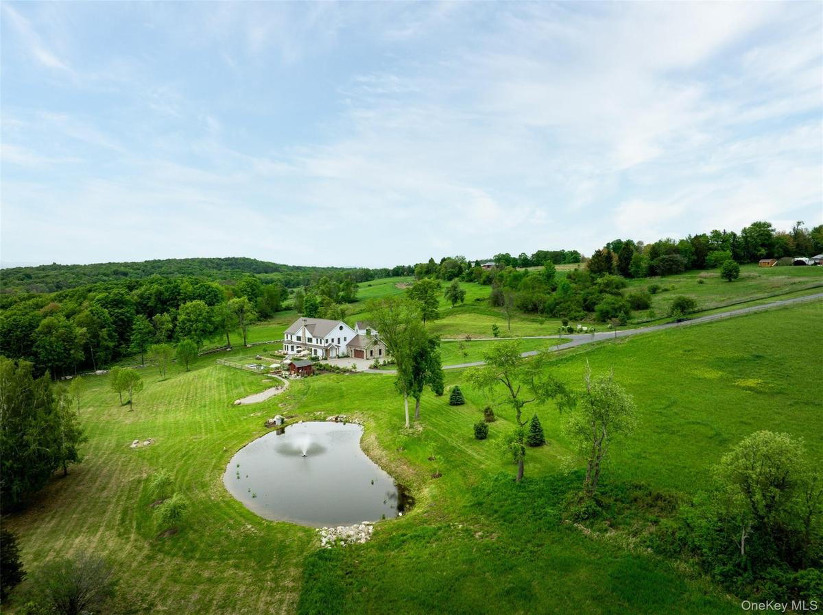 Aerial view of sparsely populated area with a nearby body of water
