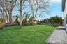 Backyard from sliding doors out from kitchen
