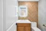 Primary spa bath with soaking tub and standing shower