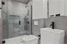Full Bath – Modern bath with ample storage and polished fixtures.