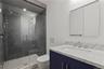 LL - Full Bath – Modern bath with ample storage and polished fixtures.