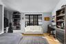 Bedroom – Large en-suite bedroom with flexible use for guests or office.