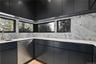 Butler’s Pantry – Fully outfitted prep pantry with sink, storage, and added appliances.