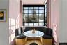 Breakfast Nook – Sunlit nook with custom banquette and designer lighting.