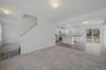 Living room shows with carpet from a different location