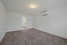 Primary bedroom has a full bath with double sinks, tub, toilet & closet