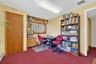 Home office featuring carpet, a baseboard radiator, and recessed lighting