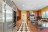 Beautiful custom Cherry cabinets with granite counters and large island