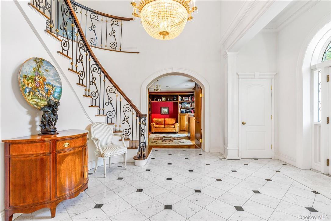 Two story foyer with beautiful details