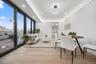 Dining area with built in shelves, light wood-type flooring, baseboards, recessed lighting, and a view of city
