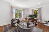 Office space featuring ornamental molding, wood finished floors, and recessed lighting