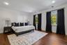 Bedroom with crown molding, multiple windows, dark wood-style flooring, and recessed lighting