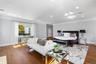 Bedroom featuring crown molding, recessed lighting, and dark wood finished floors