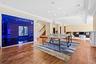 Recreation room with crown molding, hardwood / wood-style floors, and recessed lighting