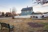 Yard at dusk with a patio area