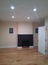 Unfurnished living room with recessed lighting, light wood-style floors, and a fireplace