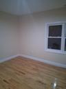 Spare room featuring light wood finished floors