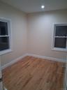 Spare room with light wood-style floors and recessed lighting