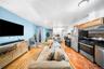 Kitchen featuring appliances with stainless steel finishes, tasteful backsplash, under cabinet range hood, and recessed lighting