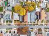 Aerial perspective of suburban area featuring property parcel outlined