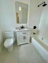 Full bath with vanity and shower / bathtub combination