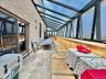 Sunroom with lofted ceiling