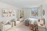 Bedroom with wood finished floors