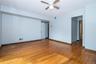 featuring light wood finished floors and a ceiling fan