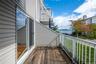 Deck with a water view off the living room