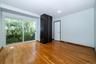 bedroom with light wood finished floors