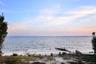 Soft shoreline moments and effortless water access - this private association beach offers an additional peaceful setting for swimming, kayaking or pa