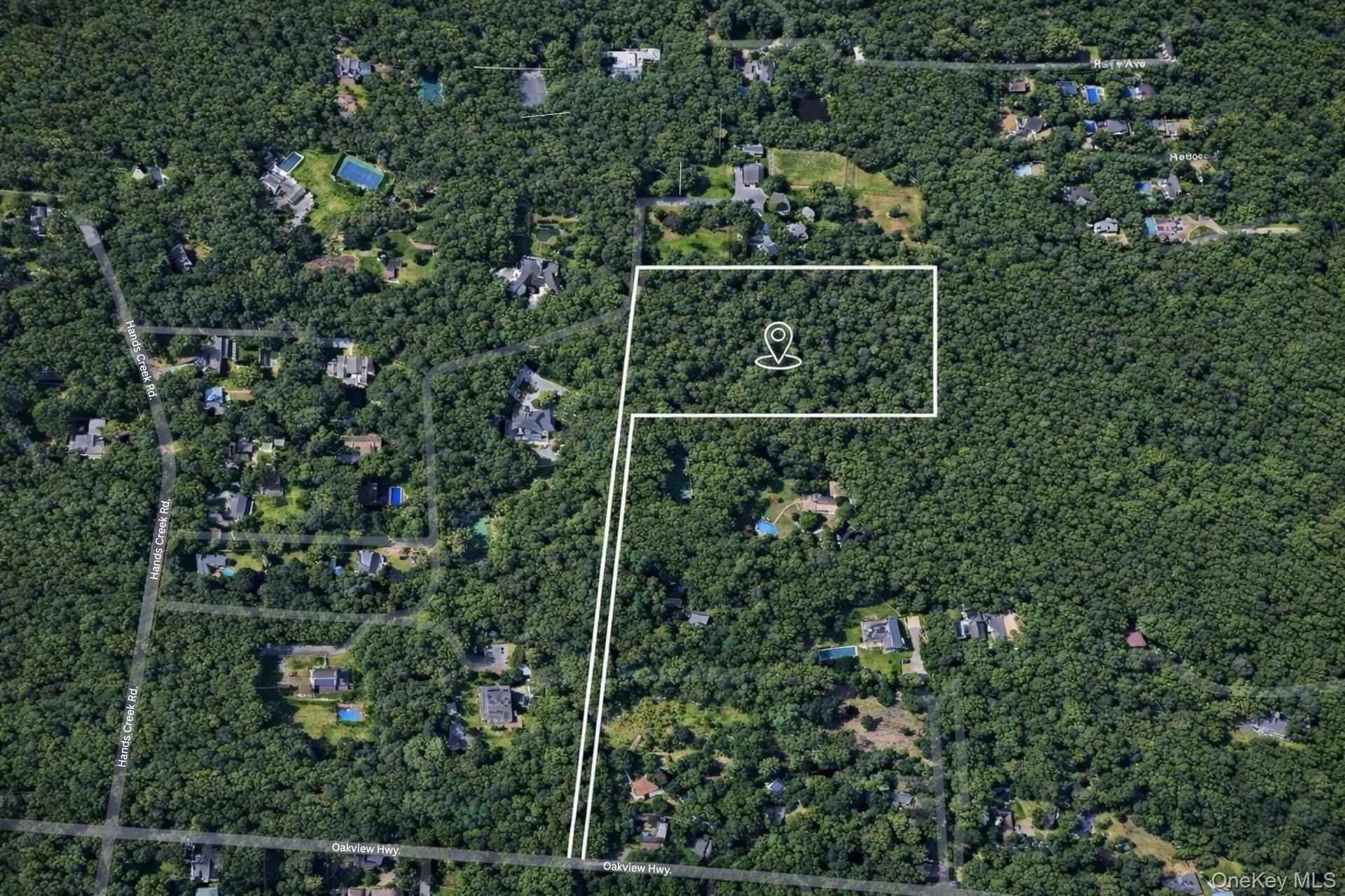 4.1 private acres in the coveted East Hampton Village Fringe.