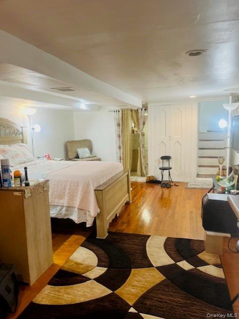 Bedroom featuring light wood-style floors