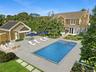 View of Pool, House and Outbuilding
