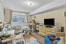 Bedroom featuring carpet floors and a textured ceiling