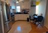 Kitchen featuring white cabinetry, ceiling fan, tasteful backsplash, light tile patterned floors, and appliances with stainless steel finishes