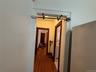 Hall with dark wood finished floors