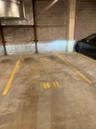 Parking garage featuring concrete block wall