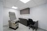 Office featuring a paneled ceiling and baseboards
