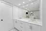 Double Sinks, Enclosed Toilet and Linen Closet