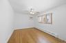 3rd Bedroom, freshly painted, ceiling fan, traditional closet preserving vintage character
