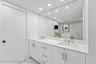 Double Sinks, Enclosed Toilet and Linen Closet