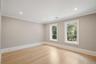Spare room with light wood-type flooring, recessed lighting, and crown molding