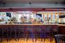 Bar area featuring tile patterned floors
