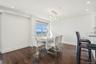 Dining room featuring recessed lighting and dark wood-style flooring