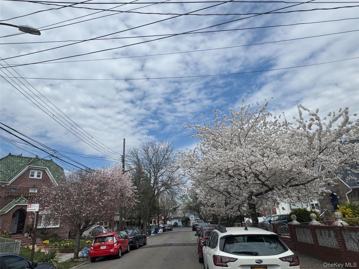 View of road with sidewalks and a residential view