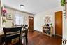 2nd Apartment Dining space featuring dark wood finished floors and baseboards