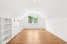 Bonus room with vaulted ceiling, light wood-type flooring, and recessed lighting