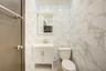 First Floor Bathroom with toilet and vanity
