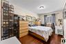 2nd Apartment Bedroom featuring dark wood-style flooring